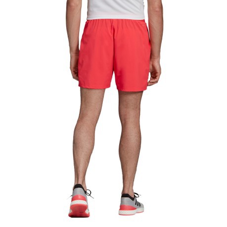 Short Tennis Uomo Club 7 rosso grigio indossato