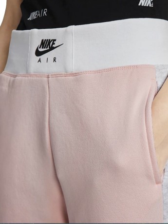 Pantalones de las señoras Nike Air gris rosa